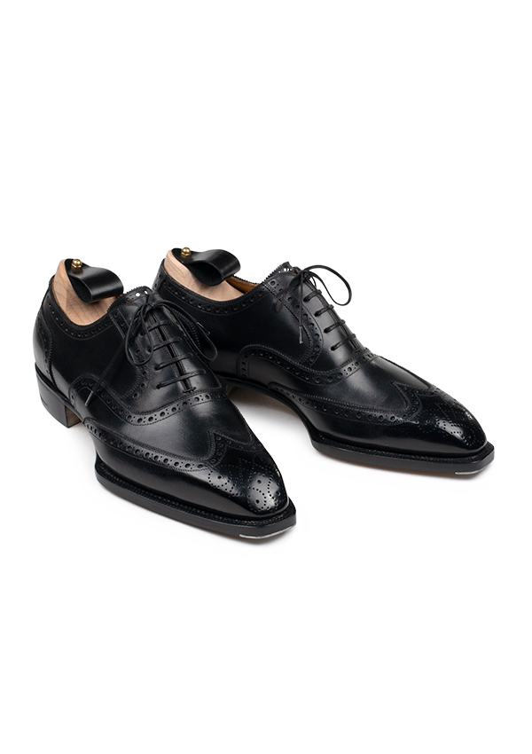 Wing tip shoes black 2025 and white