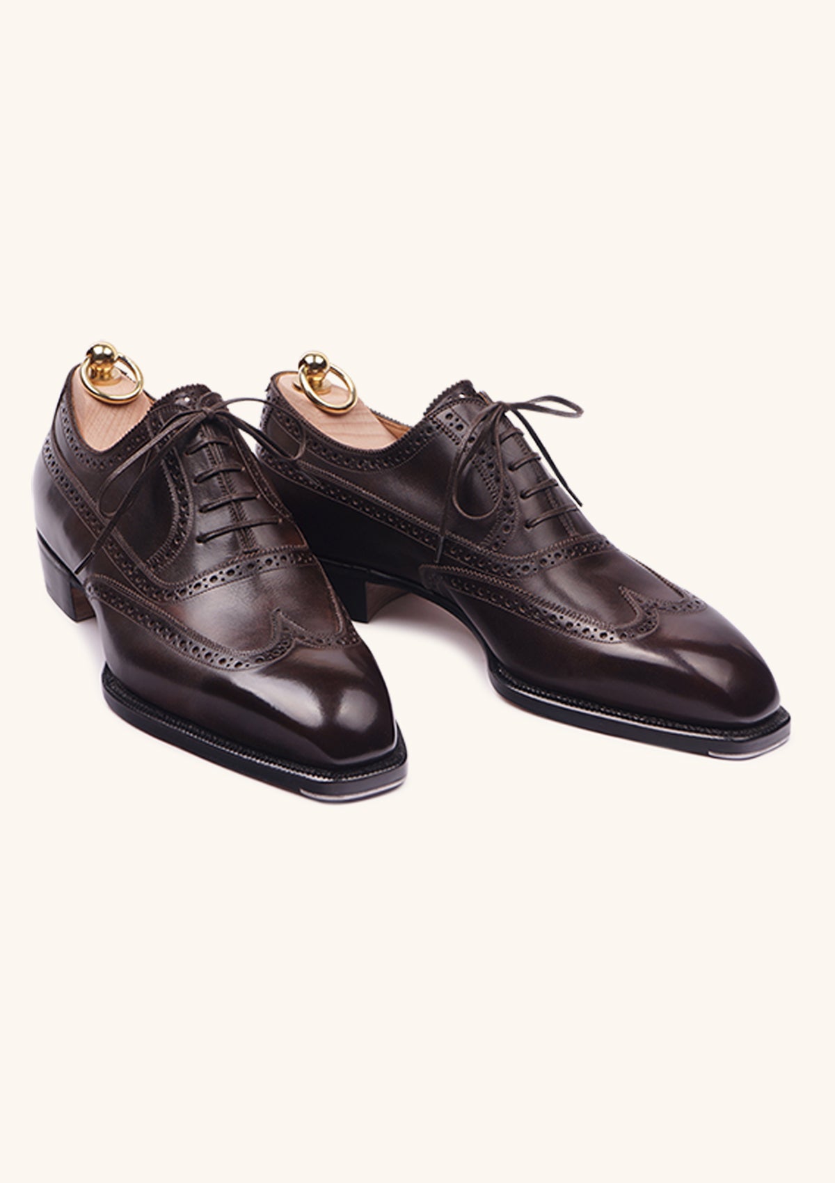 Dark brown brogued Oxfords