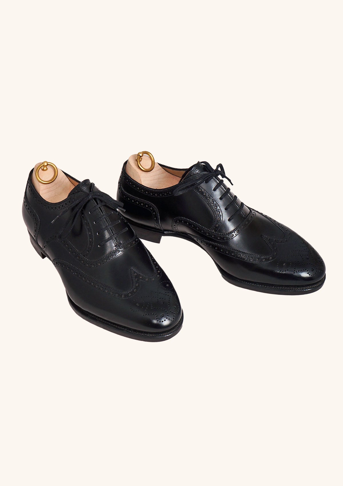 Black Wingtip Brougued Oxfords with Medallion