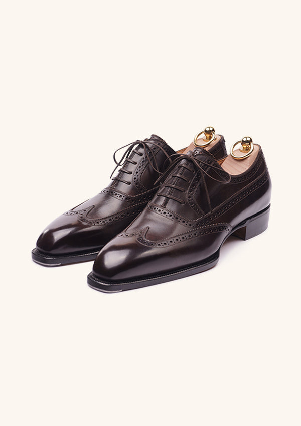 Dark brown brogued Oxfords