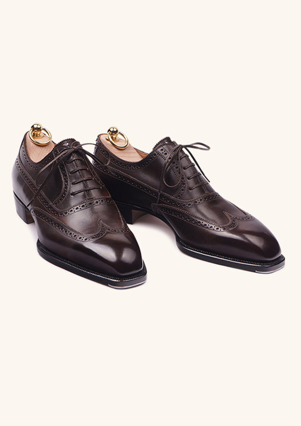 Dark brown brogued Oxfords